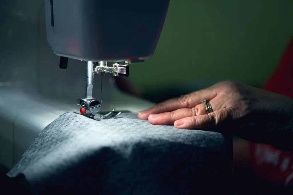 Fashion designer creating e-textile clothing with innovative materials