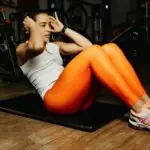 Person using a vital fitness tracker during a workout