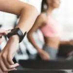 Person using a Mindrose Fitness Tracker during a workout
